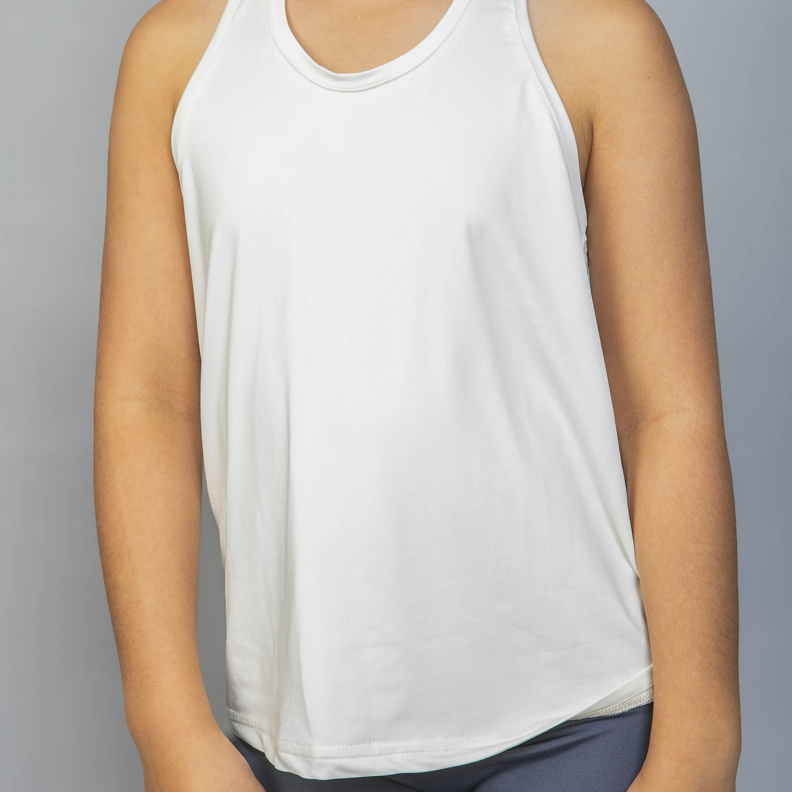 Polera Deportiva Sin Mangas Niña Crema 1