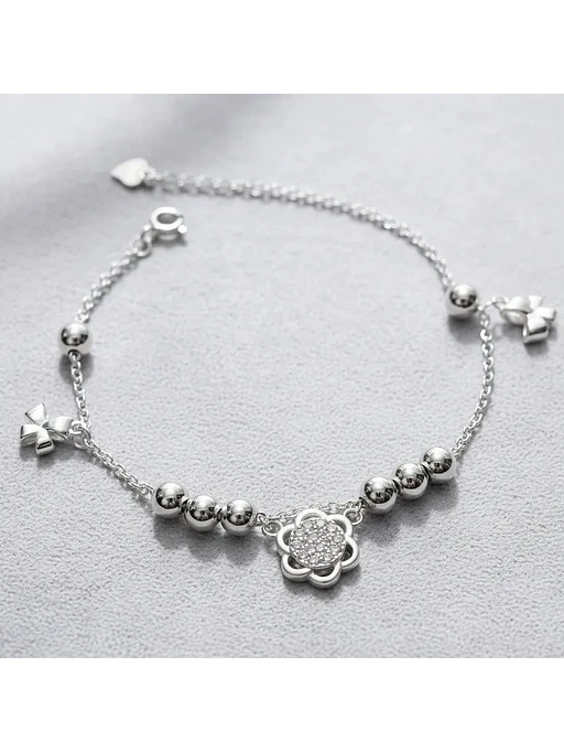 Pulsera Con Dijes Flor Y Lazos De Plata Genuina Ley 925 2