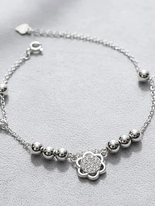 Pulsera Con Dijes Flor Y Lazos De Plata Genuina Ley 925