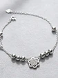 Pulsera Con Dijes Flor Y Lazos De Plata Genuina Ley 925 - Miniatura 2