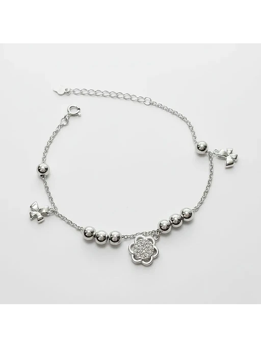 Pulsera Con Dijes Flor Y Lazos De Plata Genuina Ley 925 3
