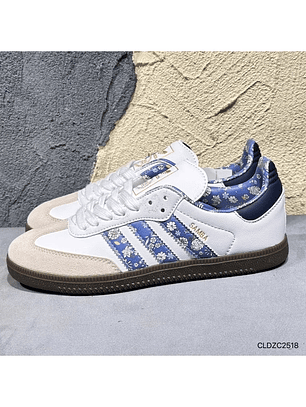 Zapatillas Sam ba blancas líneas azules flores blancas 