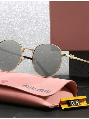 Gafas Miu redondas doradas vidrio polarizado