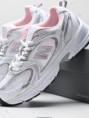 Zapatillas 530 blancas rosa bebé 