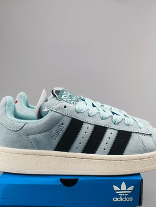 Zapatillas CAM PUS celestes líneas negras 