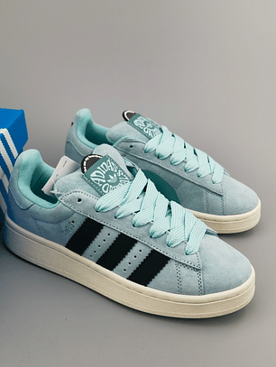 Zapatillas CAM PUS celestes líneas negras 