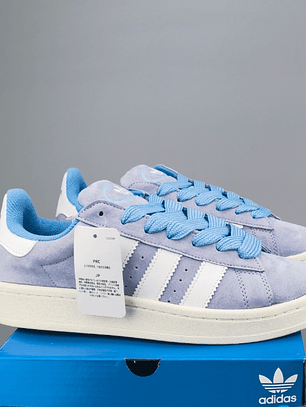 Zapatillas CAM PUS celestes lineas blancas