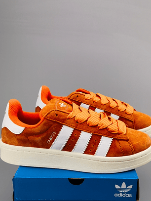 Zapatillas CAM PUS naranjas líneas blancas 