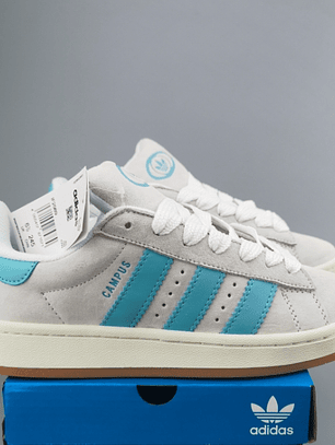 Zapatillas CAM PUS gris líneas celestes 