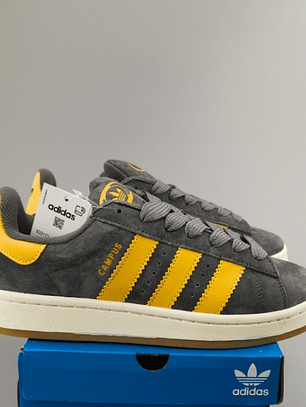 Zapatillas CAM PUS gris líneas amarillas 