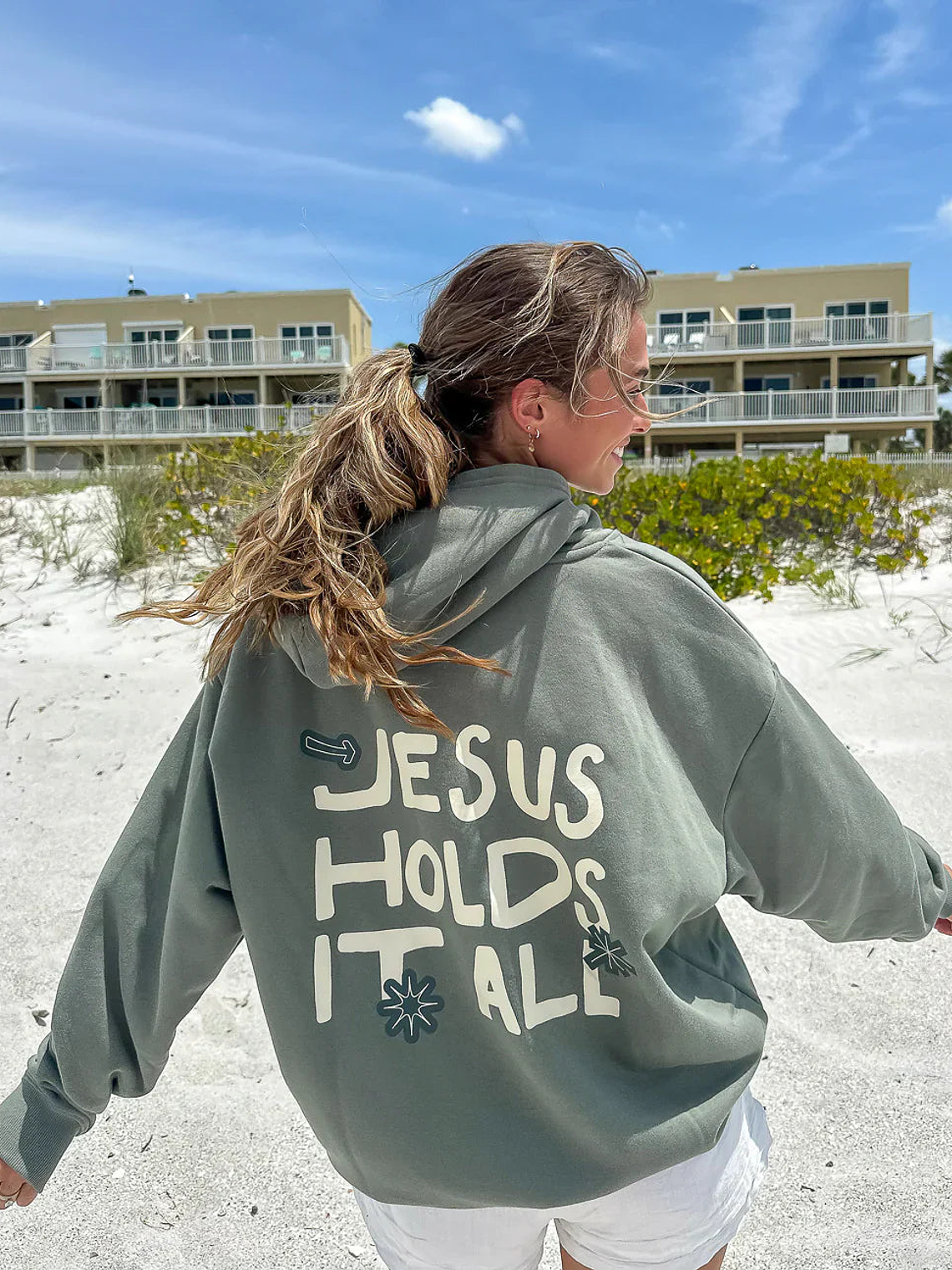 Jesus Holds It All Unisex Hoodie 1