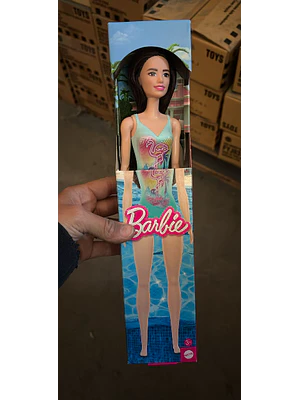 BARBIE MUÑECA DE PLAYA SORPRESA -CELESTE