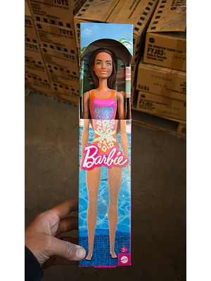 BARBIE MUÑECA DE PLAYA SORPRESA - NARANJA MORADA