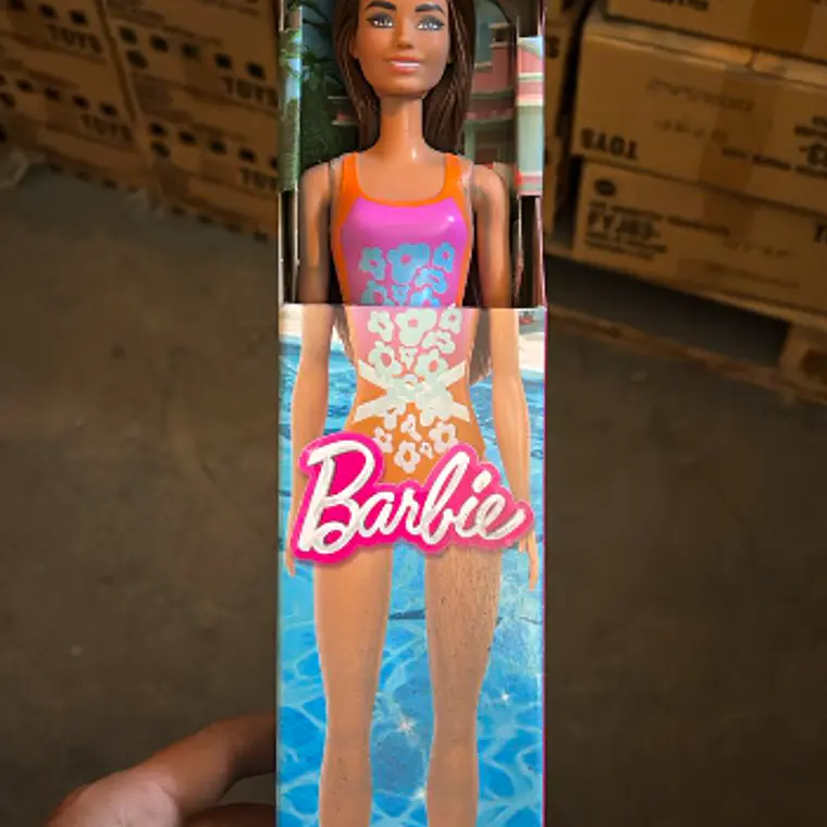 BARBIE MUÑECA DE PLAYA SORPRESA - NARANJA MORADA 1