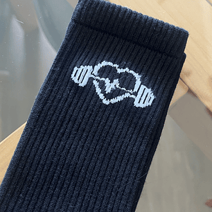 Calcetas negras corazón y pesas