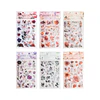 Set de stickers de flores en papel blanco
