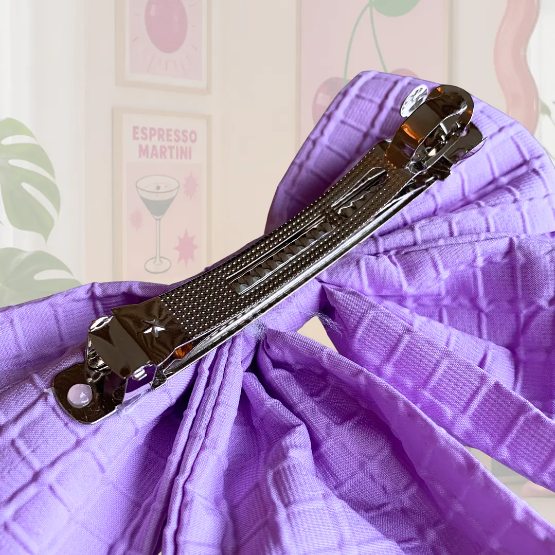 PINCHES CINTAS MORADA 2