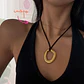 COLLAR CUERITO NEGRO DIJE DORADO - Miniatura 3