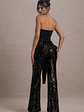 Bianco | Black Sequin Strapless Flared-Leg Jumpsuit With Drape - thumbnail 2