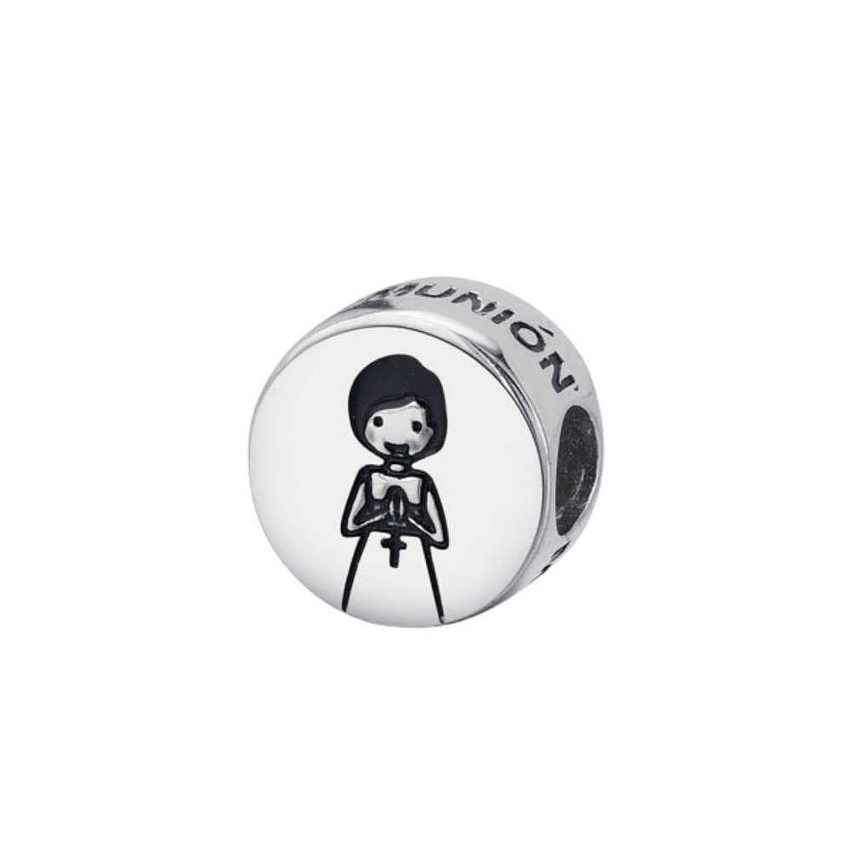 Silver disc charm with a girl in her communion dress. 1