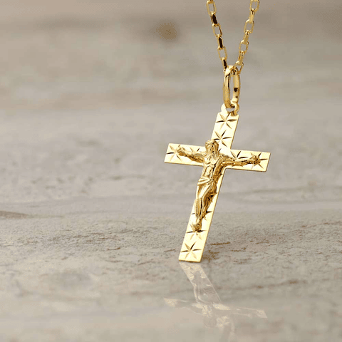 Cruz Oro amarillo 18k con cristo tallada