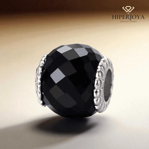 Black Murano bead, faceted, silver.