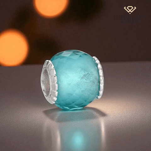 Faceted turquoise Murano glass bead, silver.