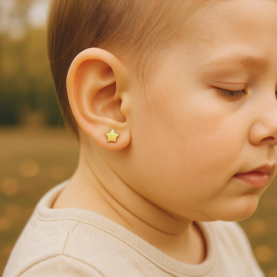 Pendiente de estrella oro 1