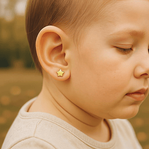 Pendiente de estrella oro