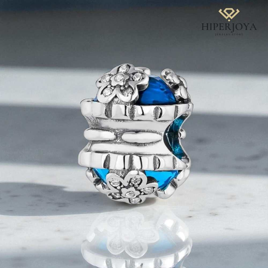 Abalorio flor con mariposa aguamarina plata 2