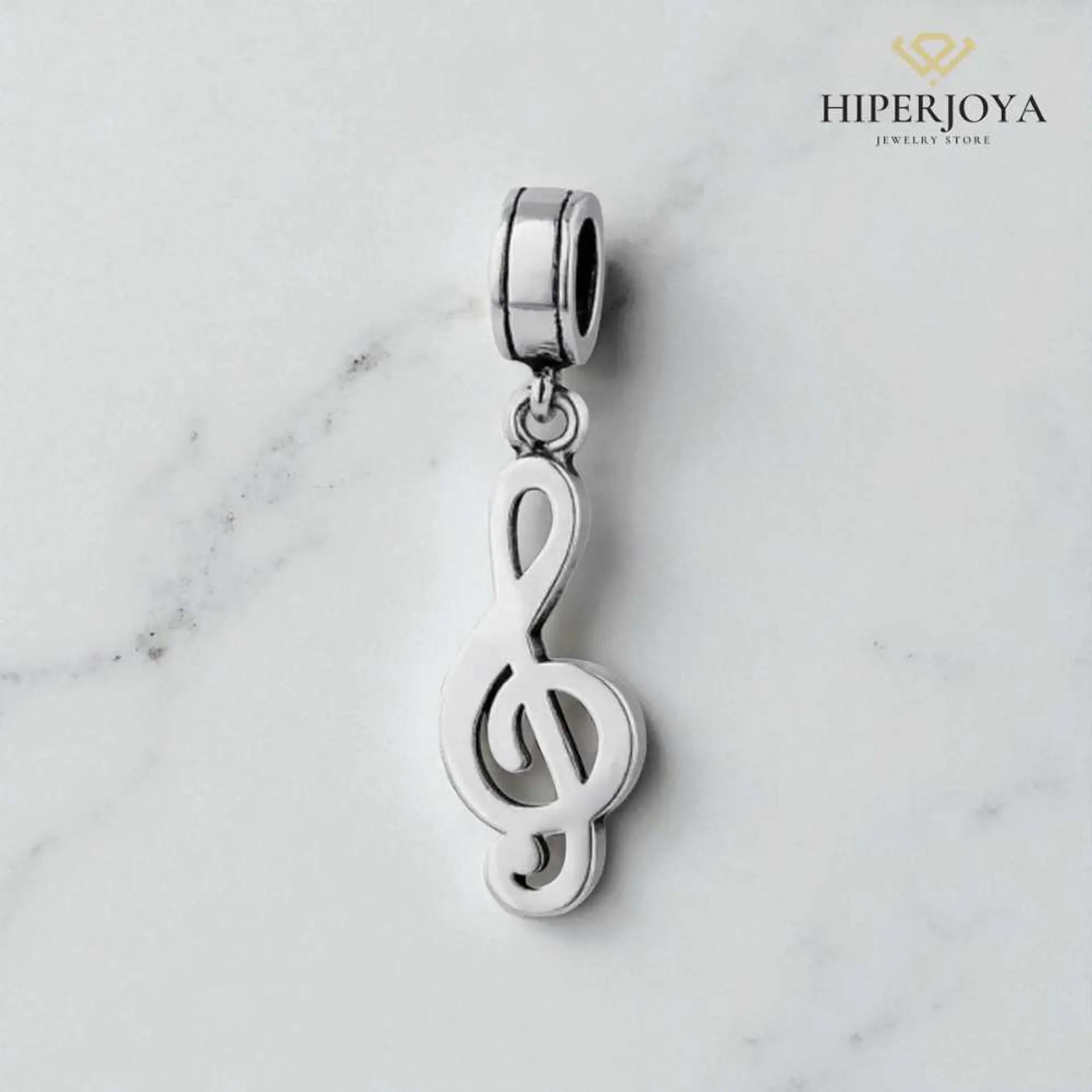 Abalorio clave de sol plata 2
