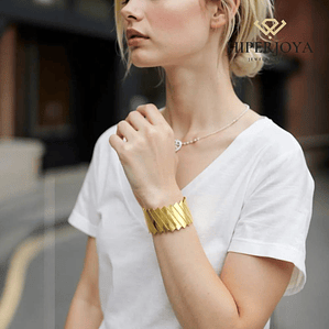 Brazalete de acero con baño de oro barras 