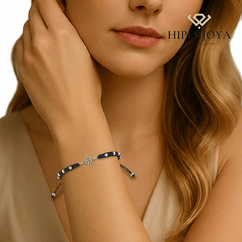 Pulsera de hilo negro con nudo de bruja 