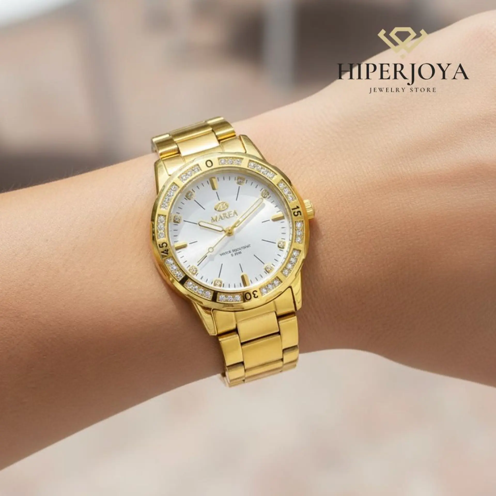 Reloj chapado en oro para mujer  2