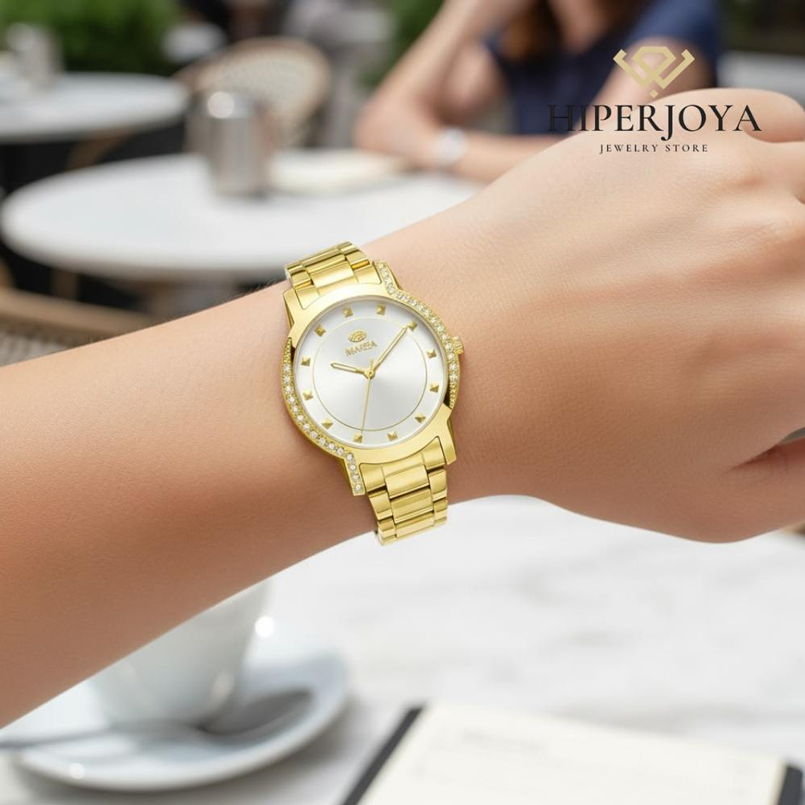 Reloj para mujer en acero dorado y circonitas  2