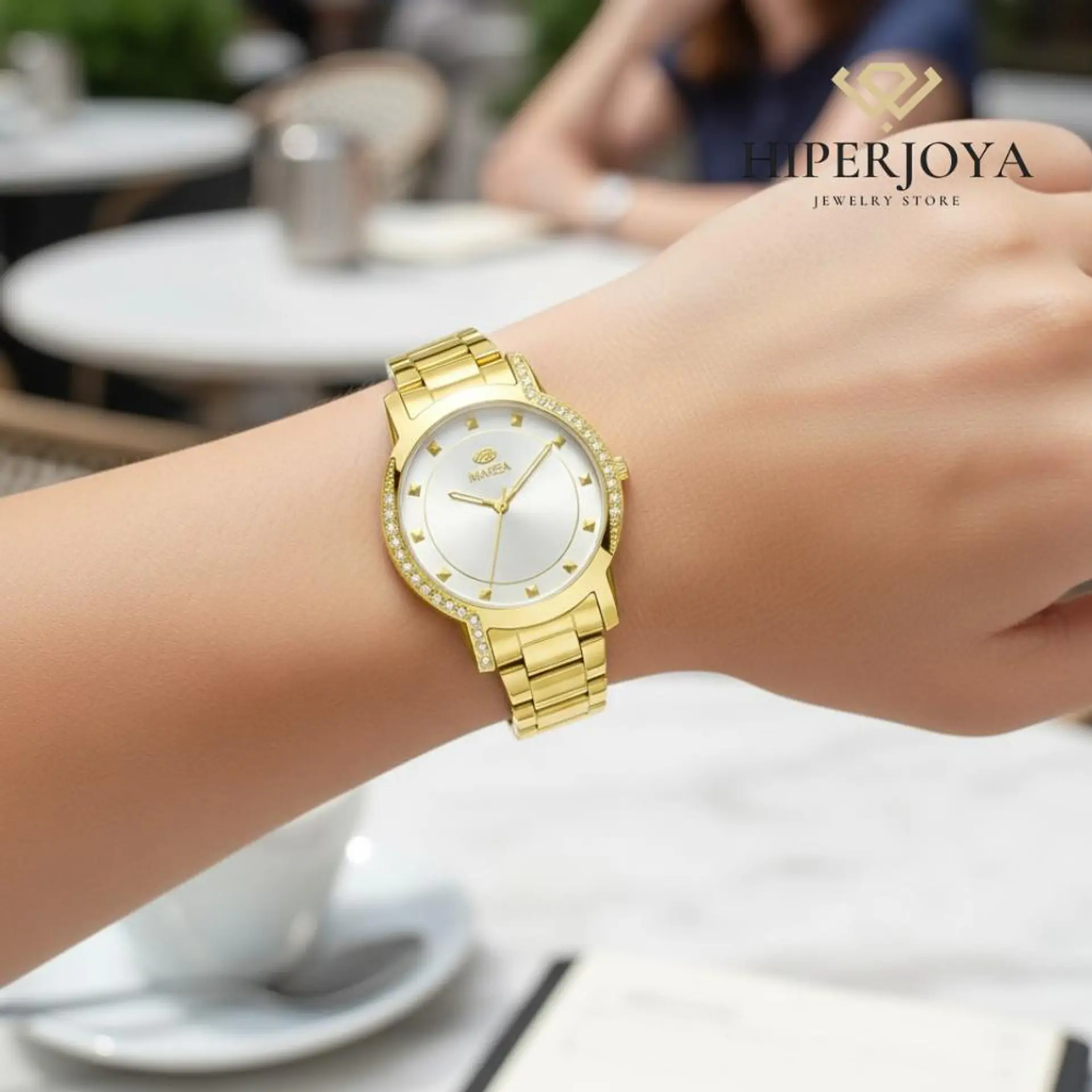 Reloj para mujer en acero dorado y circonitas  2
