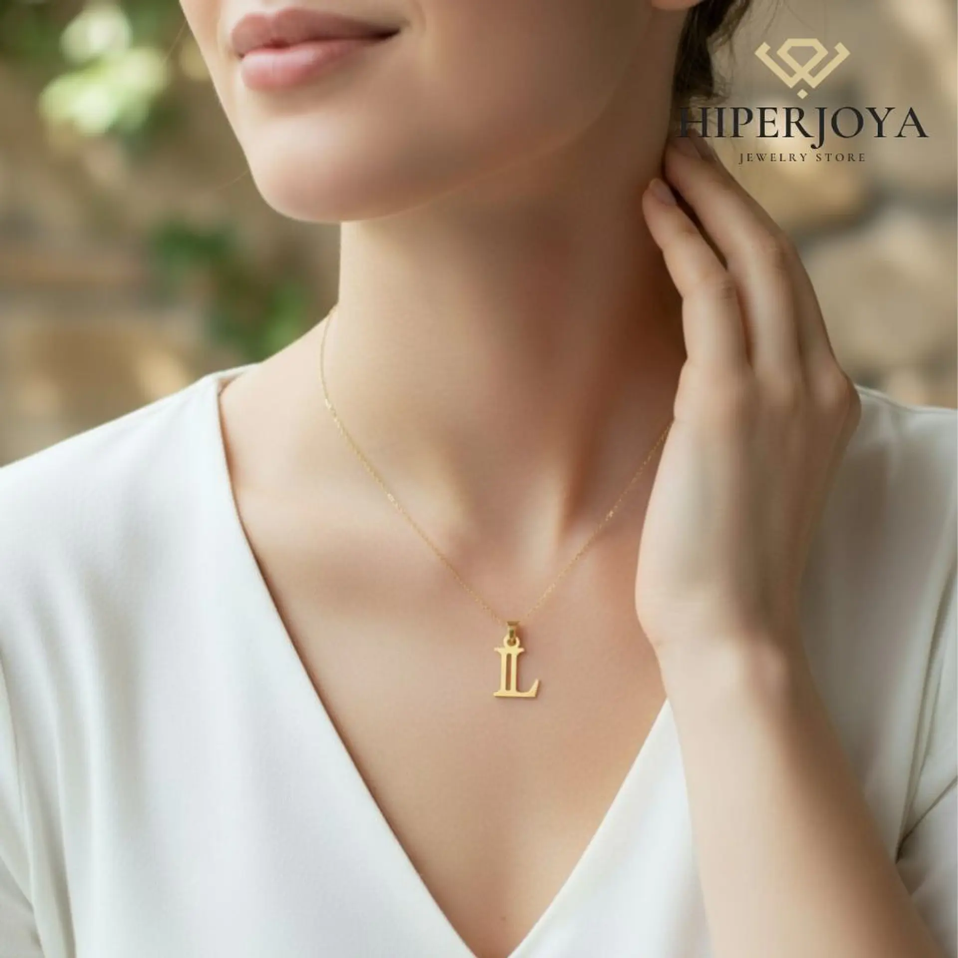 Colgante de inicial L Oro 18k 2