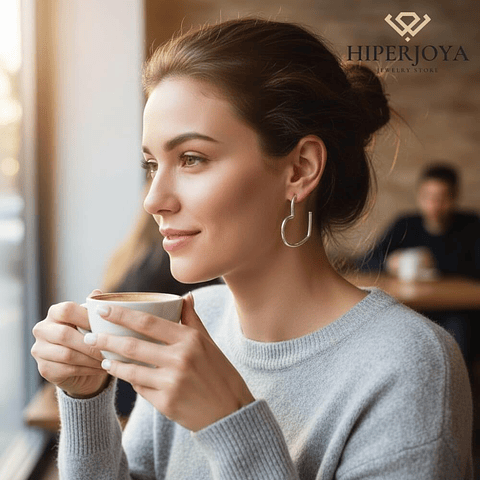 Pendientes de acero medio corazón 