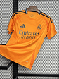 CAMISOLA DO REAL MADRID 24/25 LARANJA - Thumbnail 1