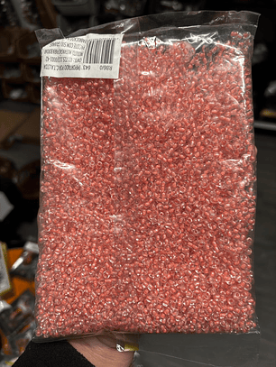 Missanga transparente com miolo salmão 4mm 500g