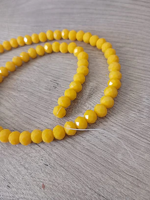 Fio de contas cristal amarelo queimado leitoso 6mm - 60 contas