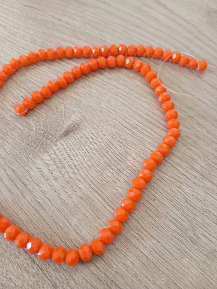 Fio de contas cristal laranja leitoso 4mm - 86 contas