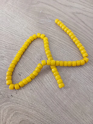 Pingente mini folha dourada