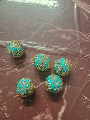 Firma bola azul turquesa trabalhada com strass