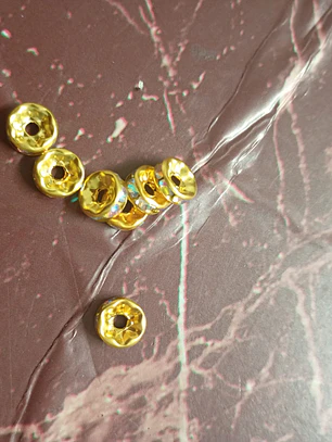 Entremeio dourado com strass
