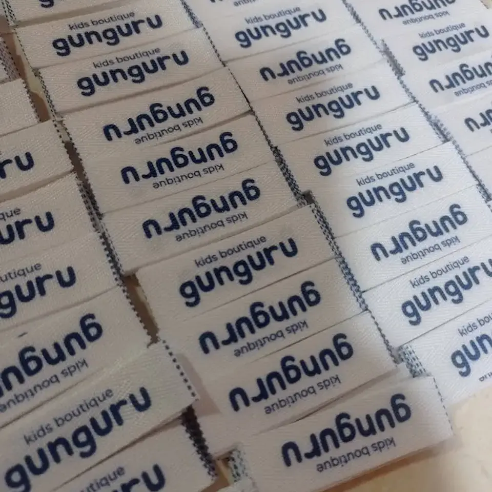 Pack 1.000 Etiquetas de costura personalizadas en Cinta Espiga 1