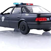 Patrulla OCP Ford Taurus con Figura de RoboCop | Jada Toys Escala 1:24 | Metal Die-Cast