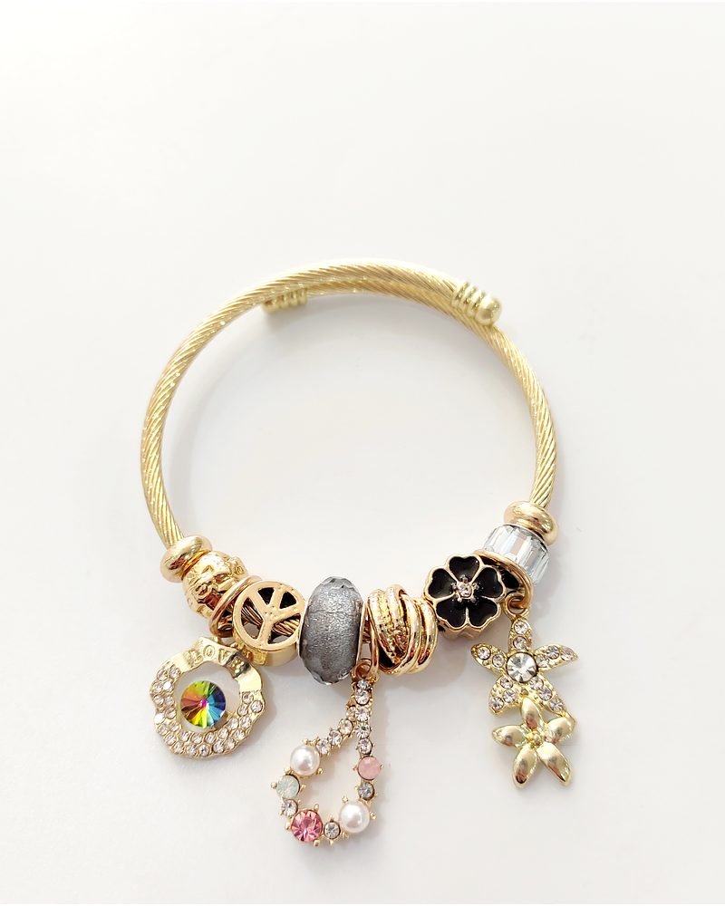 Pulsera ajustable de gota con perlas dorada