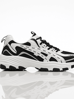 Zapatillas deportivas blancas y negras unisex 