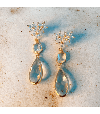 Aro dorado trío de flores y cristales